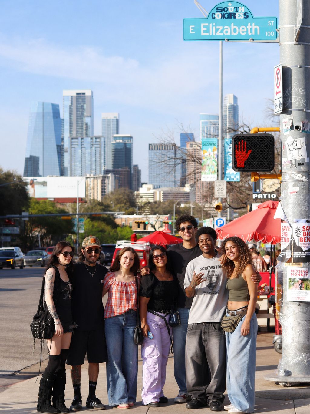 Group of friends posing downtown